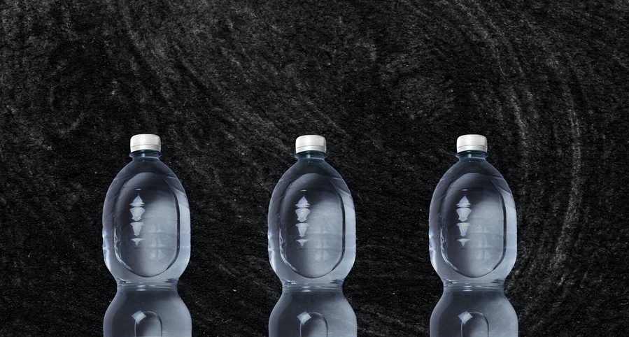 three plastic water bottles