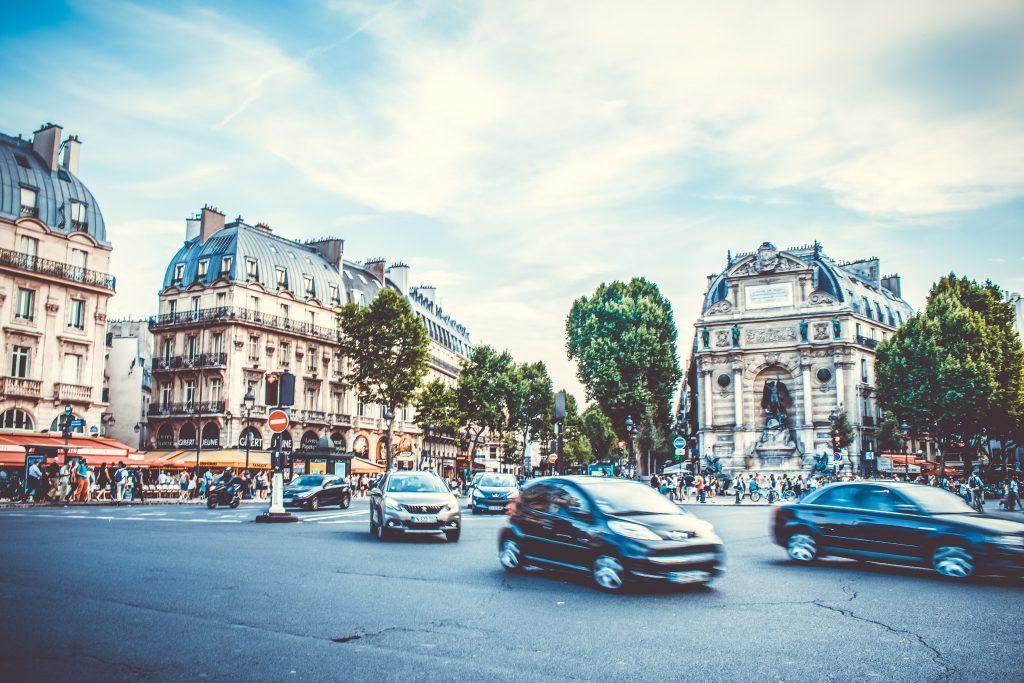 Busy and nosiy street in the main city of France with the community