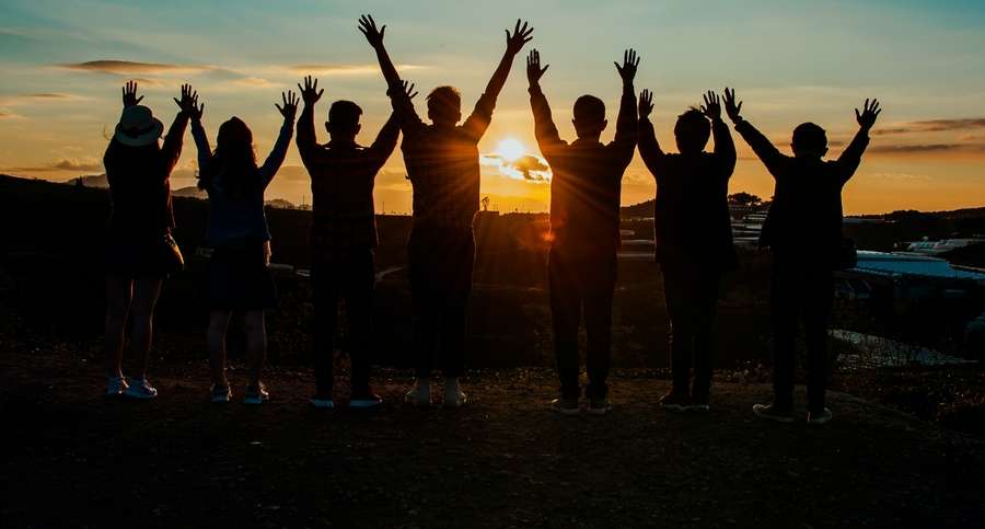 People Silhouette during Sunset