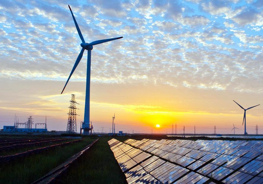 Wind and solar array: examples of renewable energy.