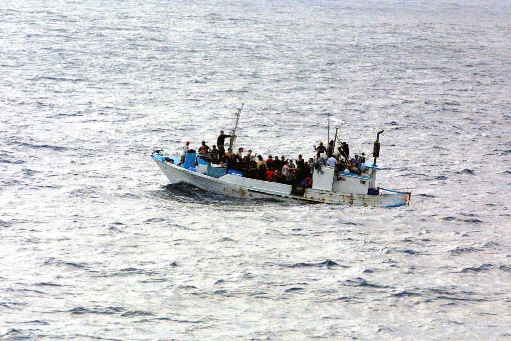 Asylum seekers arriving by boat.