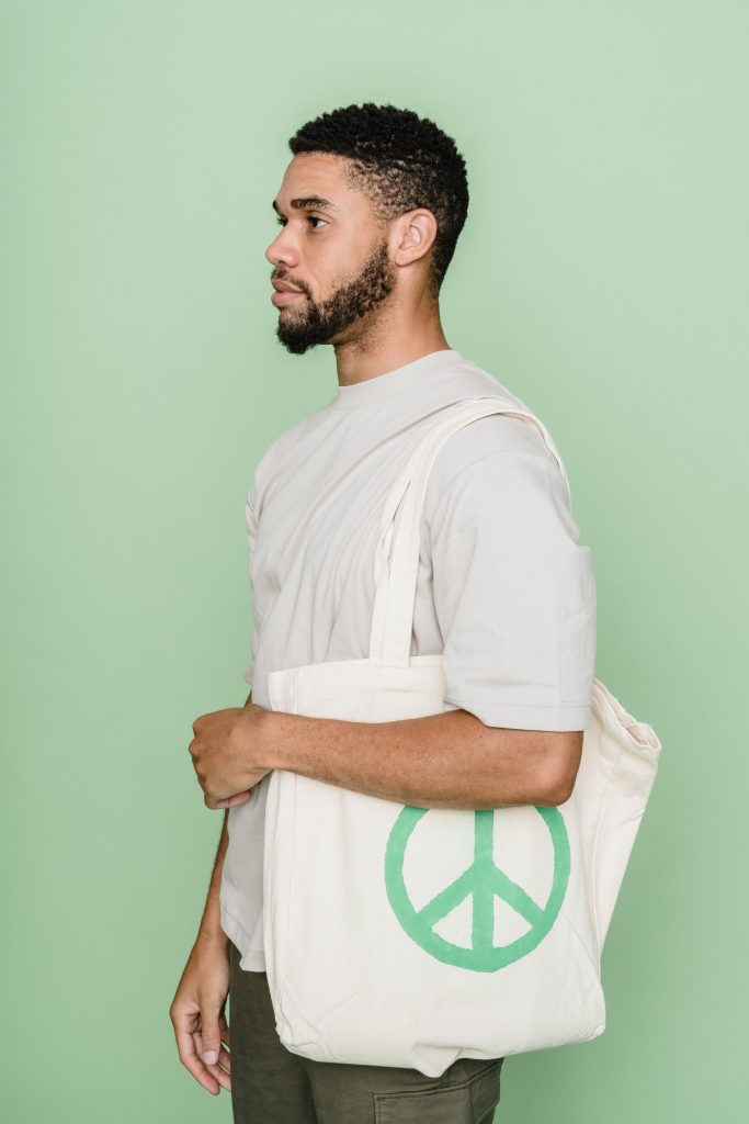 Reuse shopping bags to be more sustainable at home.